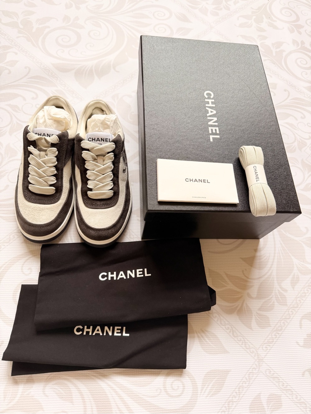 CHANEL Black and Cream Low-Top Men’s Sneakers - Picture 2 of 10